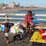 Yolene and her family spend the day on the pier, and sometimes much of the night too.